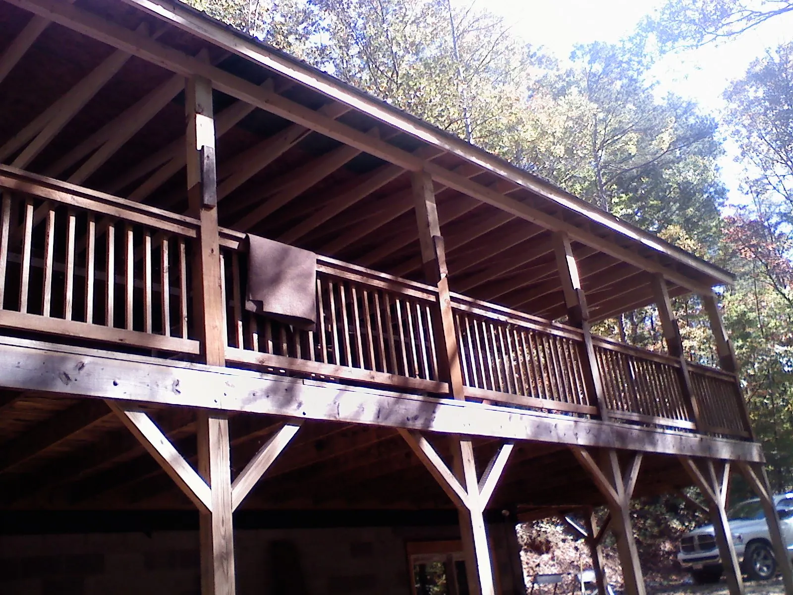 Timber framing under a new elevated porch and deck — Roof Leak Repair in Creston by Roofing Brothers